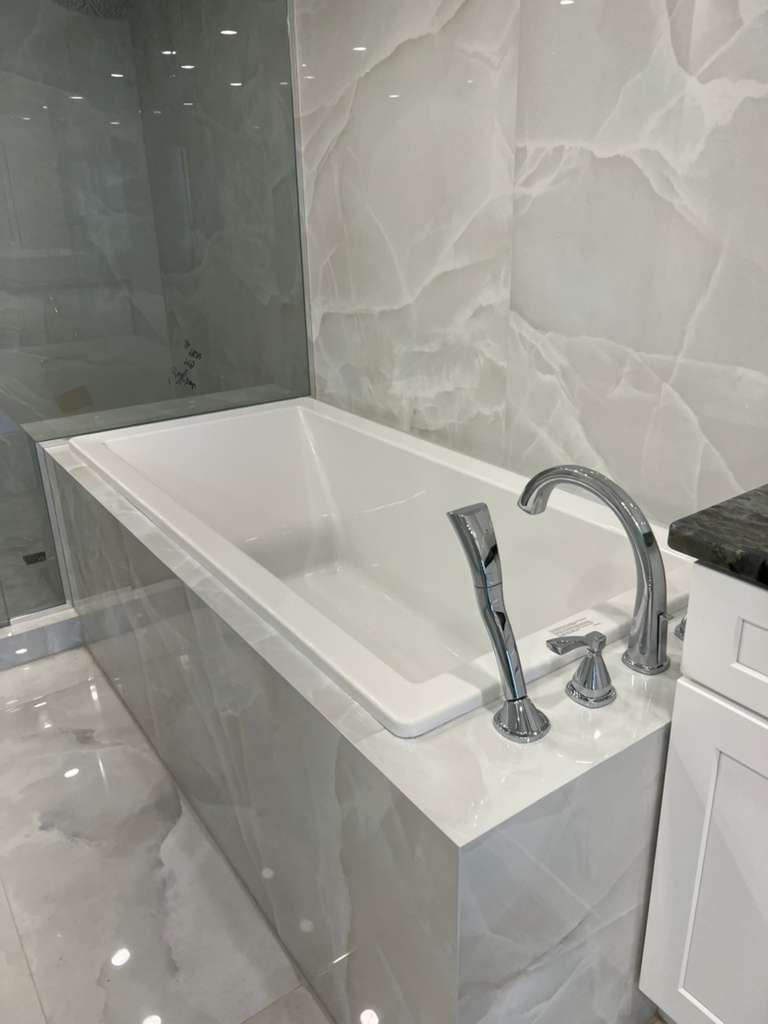 Finished bathroom tub installation by Standard Plumbing